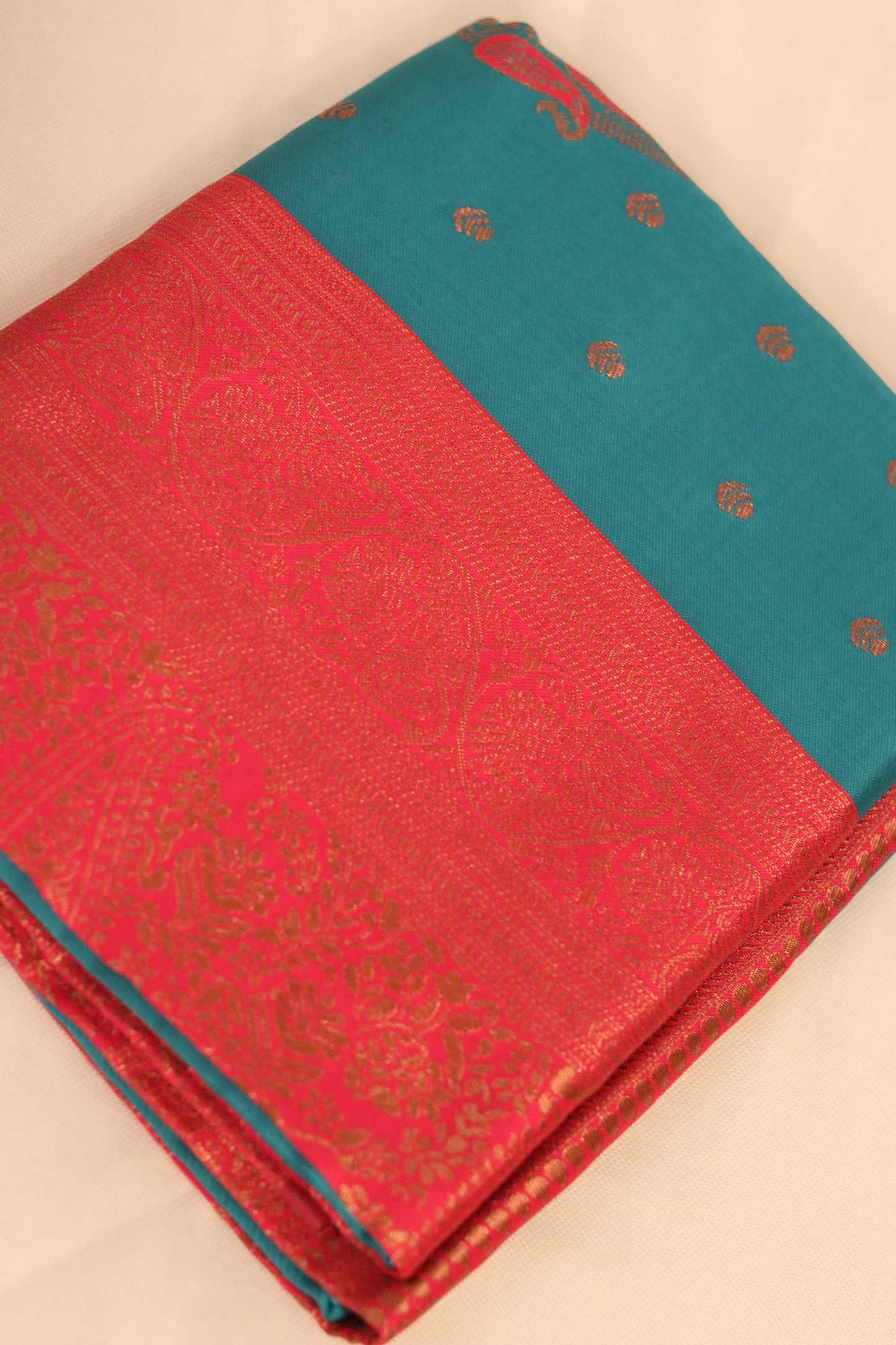 Teal Blue Saree with Pink Border